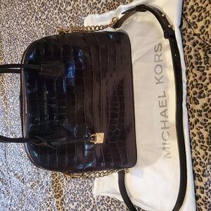 Michael Kors deep burgundy croc purse. No tag but basically new. Used few times-